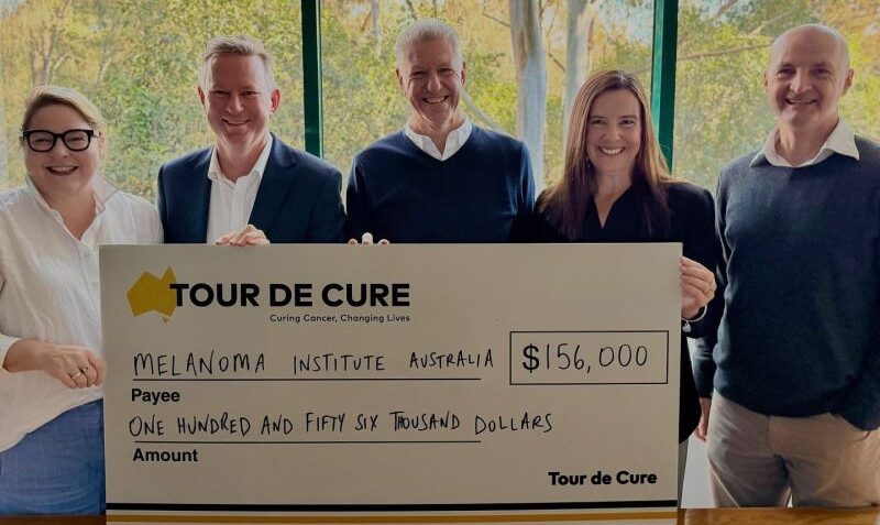 Melanoma Institute Australia CEO Matthew Browne received a cheque from Tour de Cure Australia for funds raised at the 2024 Long Lunch