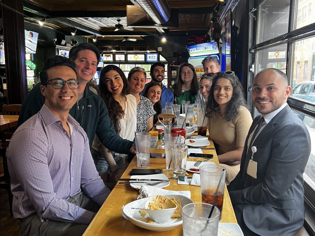 Ria Mulherkar: First happy hour of the year with our new PGY-2s, our new physics residents, and our rotating med students!