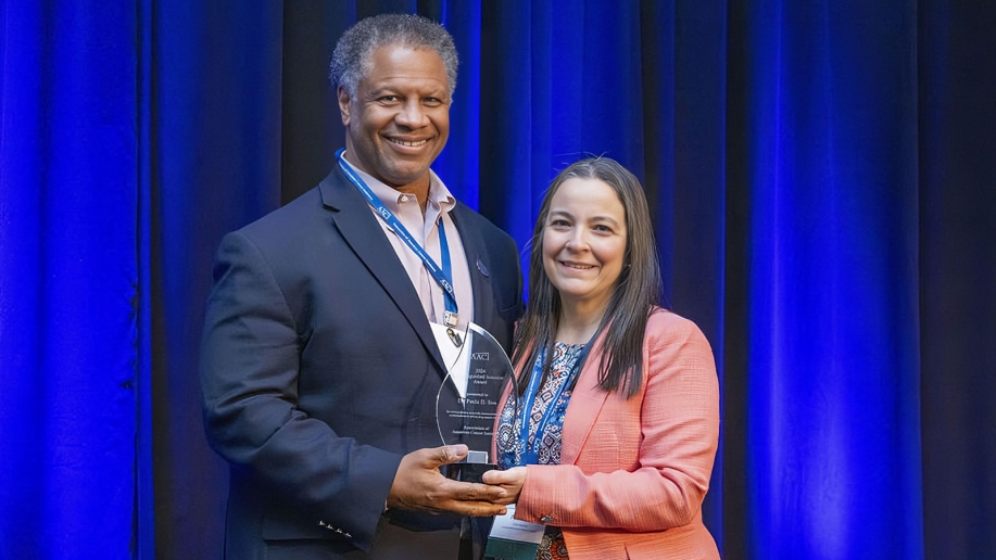 Paula D. Bos received the Distinguished Scientist award at AACI/CCAF Annual Meeting