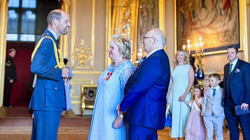 Lynn and Lynn Lucas, founders of Chris Lucas Trust, received MBEs from Prince William