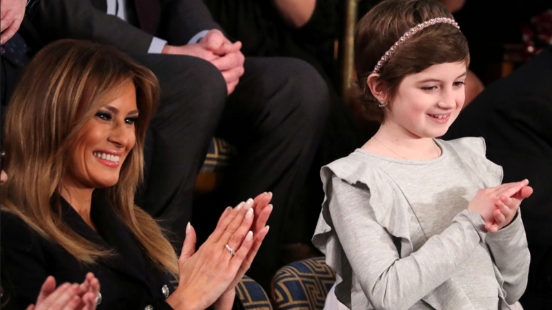 Brain cancer survivor Grace Eline (right) and first lady Melania Trump (left) at the State of the Union address.Jonathan Ernst/REUTERS