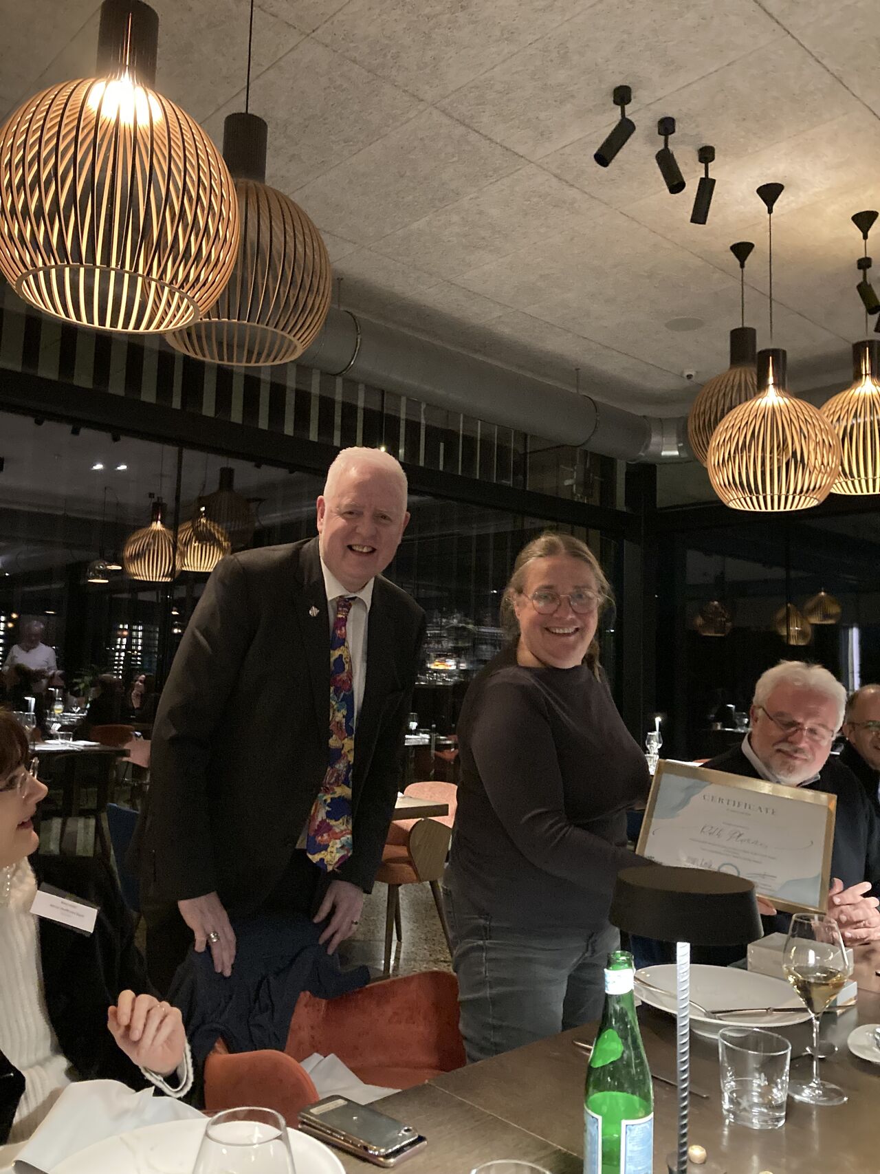 Mark Lawler Presents Appreciation Award to Ruth Plummer for Leadership at CDDF